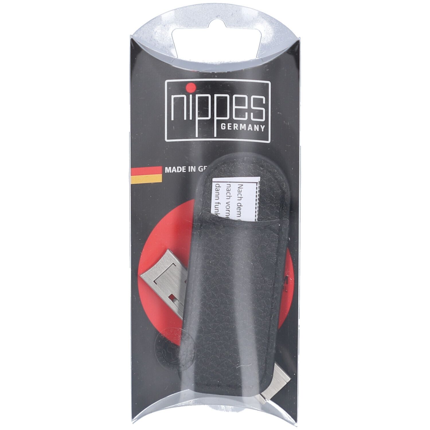 Nagelknipser in schwarzer Ledertasche, verpackt in Blisterverpackung. Marke: nippes GERMANY.