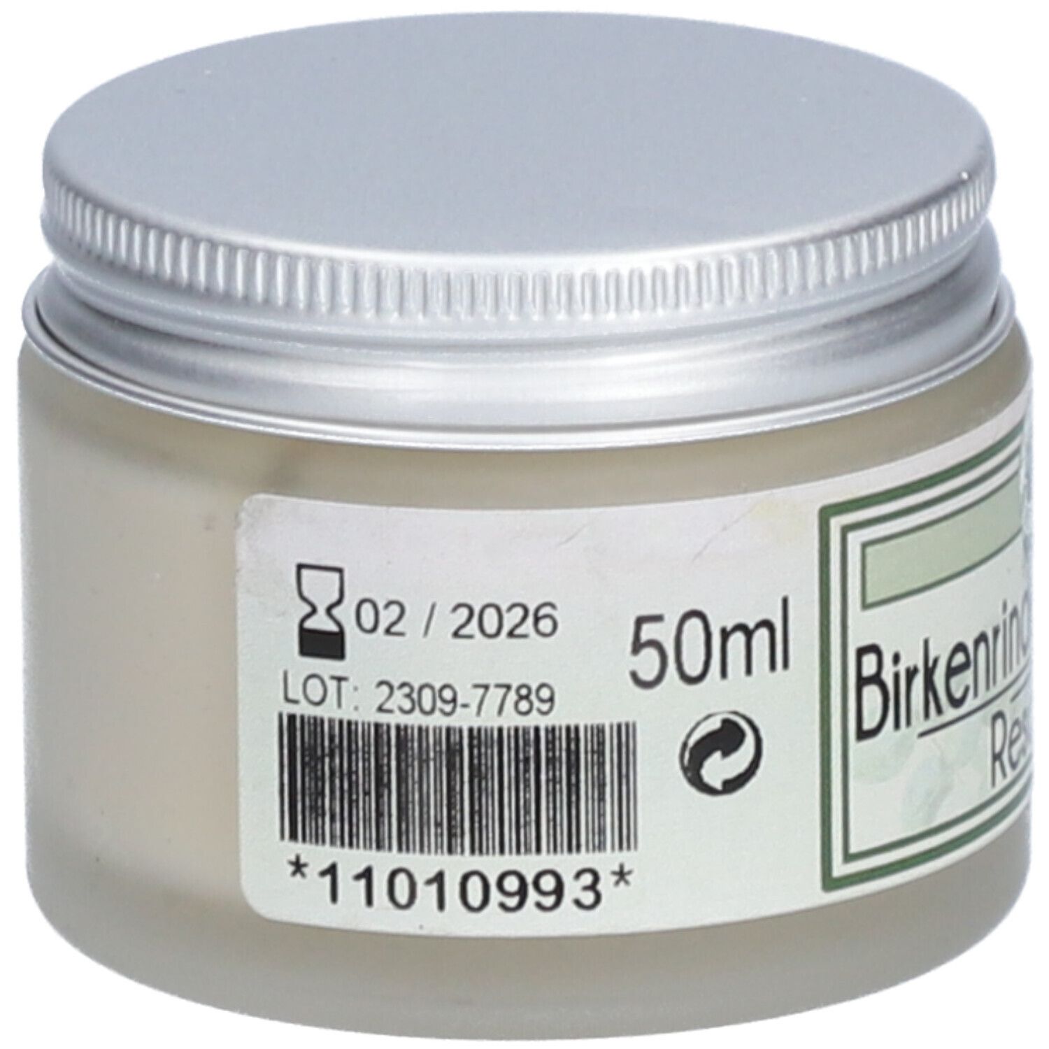 Creme-Glas mit silbernem Deckel. Auf dem Etikett sind Haltbarkeitsdatum, Chargennummer und Barcode zu sehen.