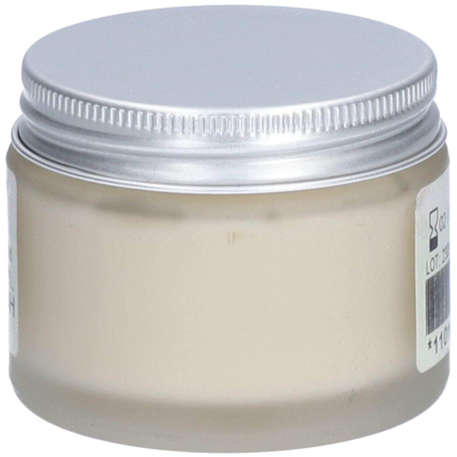 Creme-Glas mit silbernem Deckel. Das Glas ist halb gefüllt mit einer cremigen Substanz.