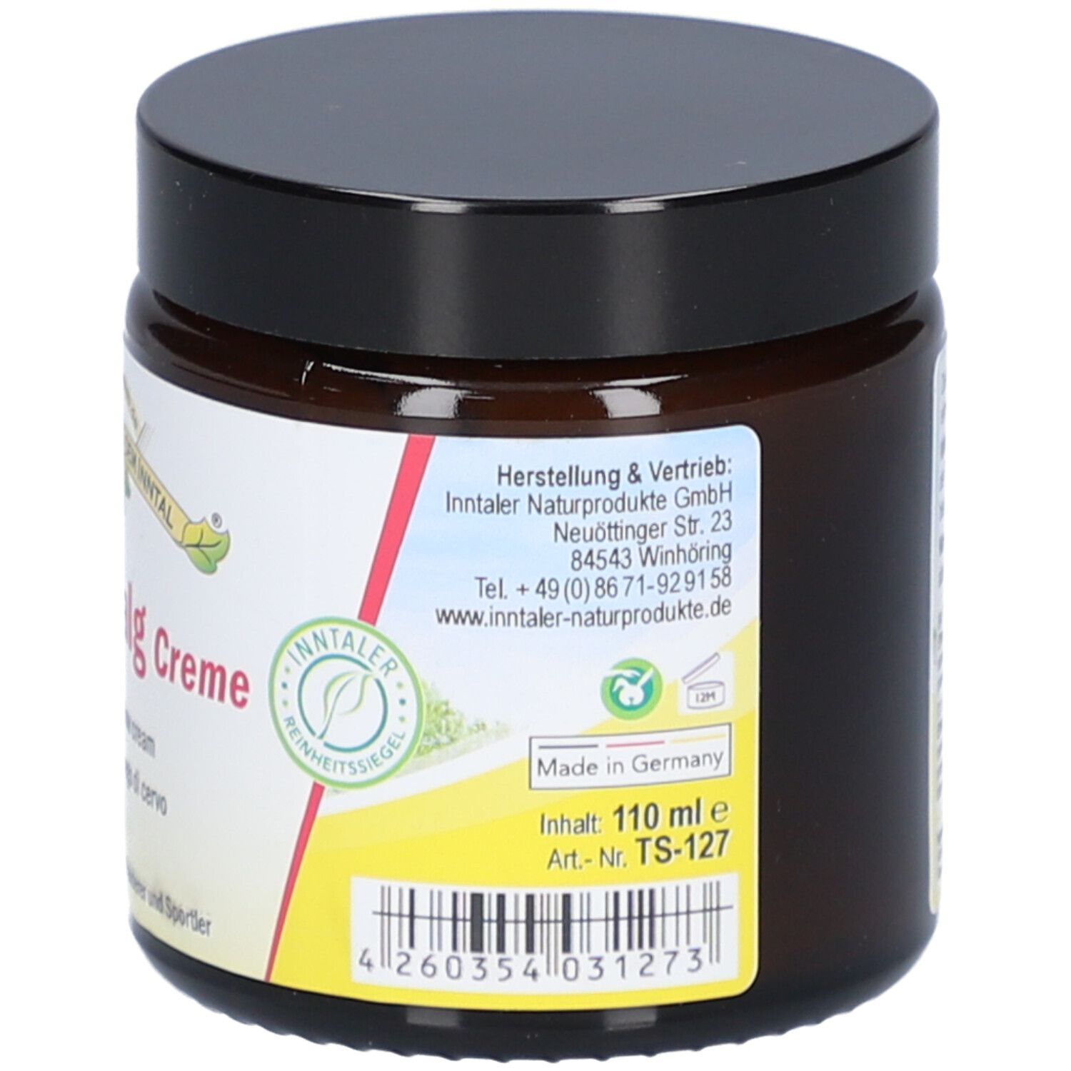 Braunes Tiegel mit schwarzem Deckel. Auf dem Etikett steht "110 ml" und ein Barcode.