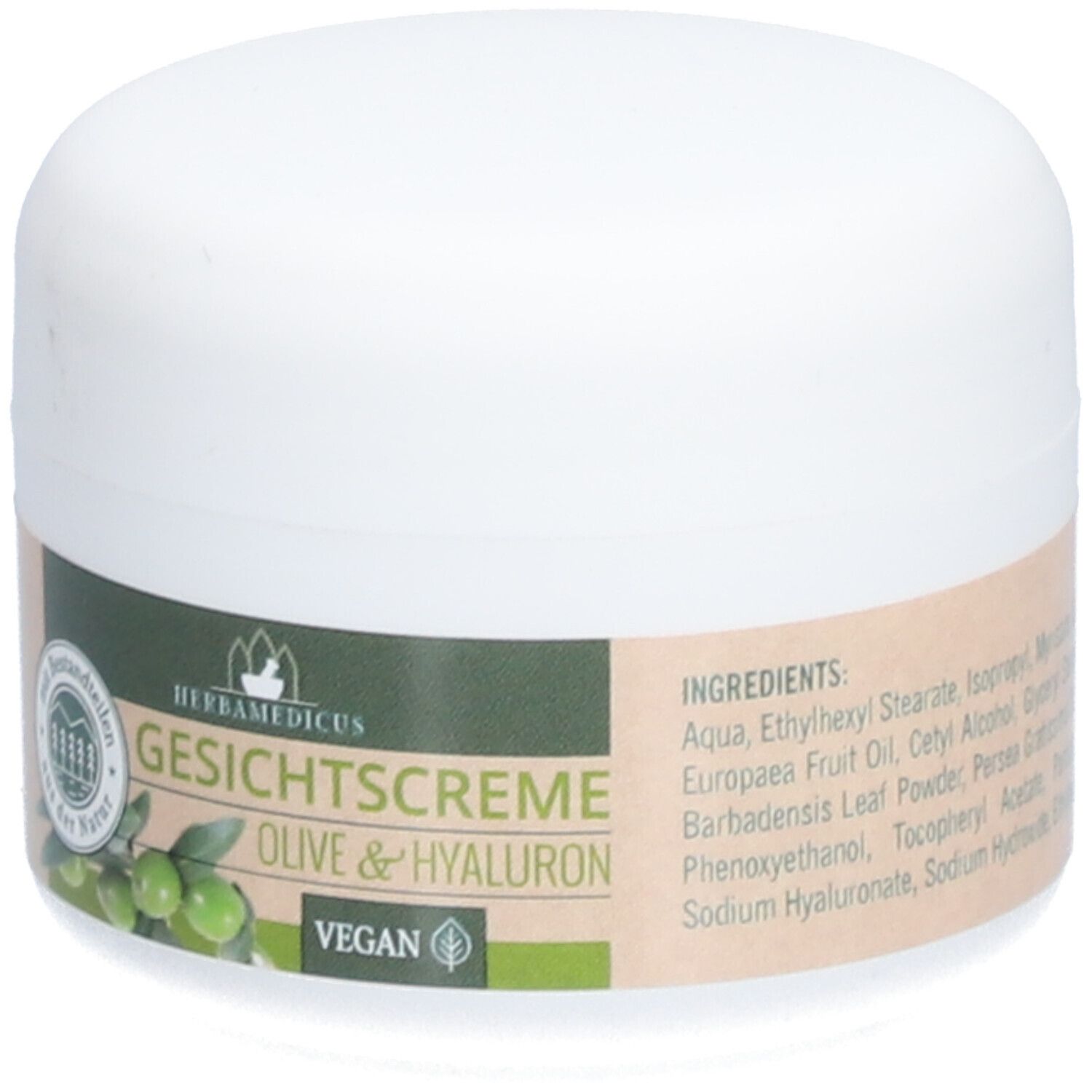 Weiße Creme-Dose mit Etikett. Aufschrift: Herbamedicus Gesichtscreme Olive & Hyaluron. Vegan-Siegel. Inhaltsstoffe.
