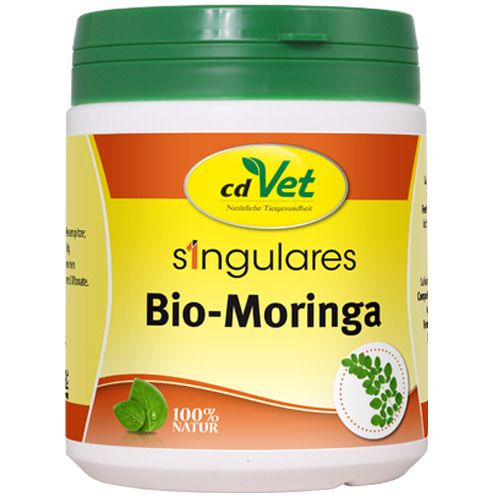 Behälter mit grünem Deckel. Aufschrift: cd Vet singulares Bio-Moringa. Logo mit Blättern. Aufschrift: 100% Natur.