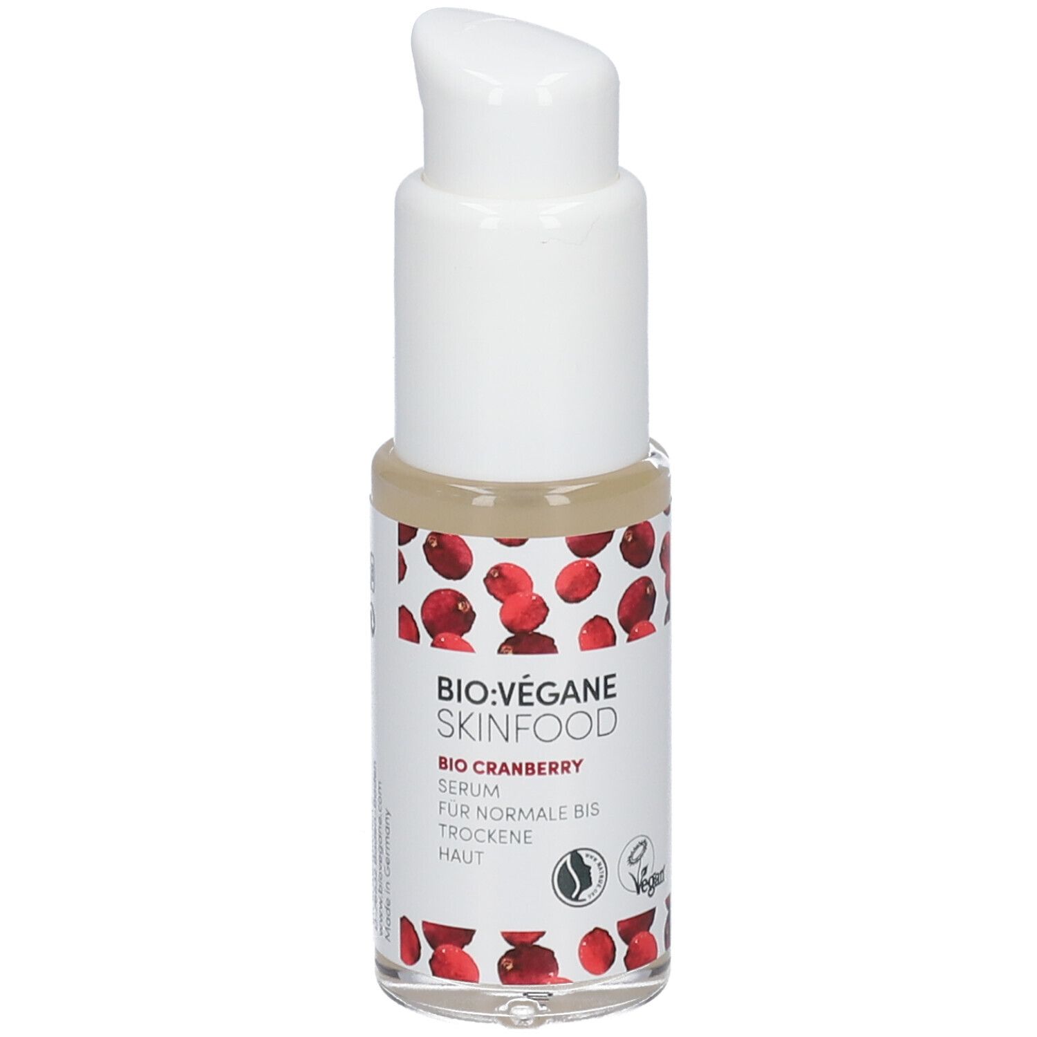Serumflasche mit weißem Pumpkopf. Aufschrift: BIO:VÉGANE SKINFOOD, Organic Cranberry Serum, für normale bis trockene Haut. Vegan-Siegel.