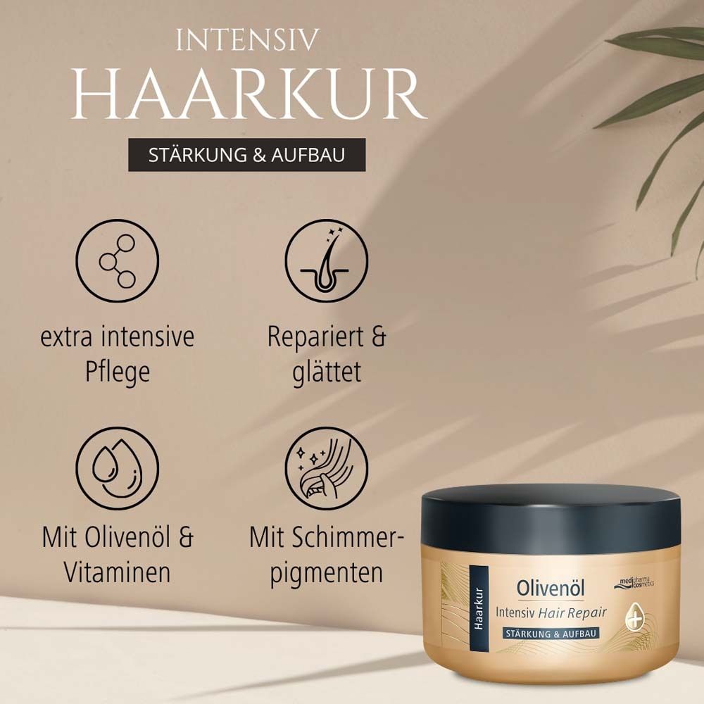 Behälter von Olivenöl Intensiv Hair Repair Haarkur. Schwarzer Deckel, goldfarbener Behälter. Produktname und Logo.