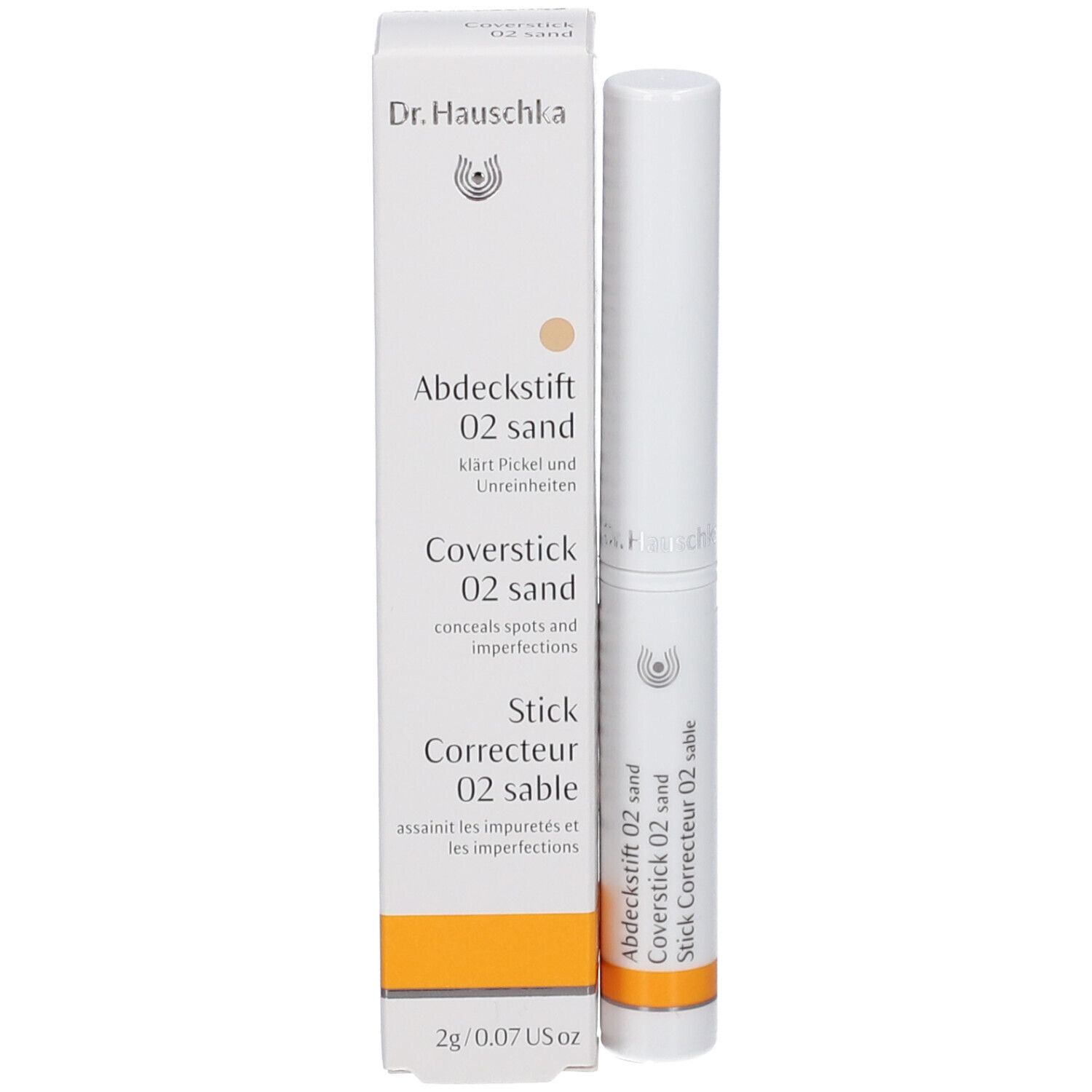 Produktverpackung und Stift. Verpackung: weiß, Beschriftung: Dr. Hauschka, Abdeckstift 02 sand, Coverstick 02 sand, Stick Correcteur 02 sable.