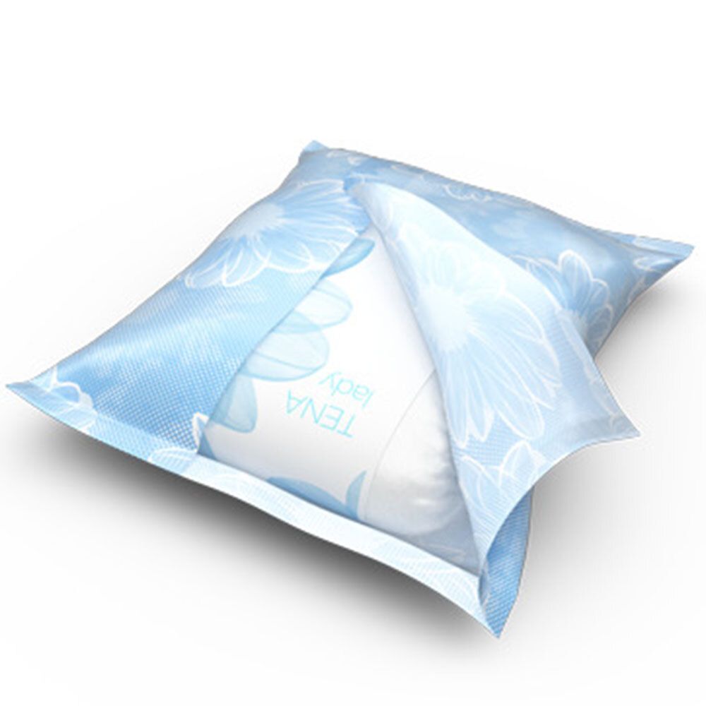 Geöffnete Verpackung mit TENA® LADY Discreet EXTRA. Blau, mit Blumendesign. Auf weißem Hintergrund.