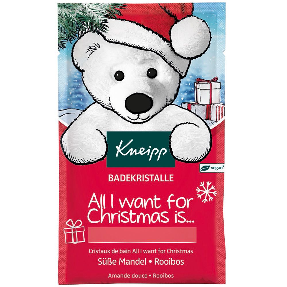 Rote Badezusatz-Verpackung mit Weihnachtsbär und Kneipp-Logo. Text: All I want for Christmas is... Süße Mandel & Rooibos.