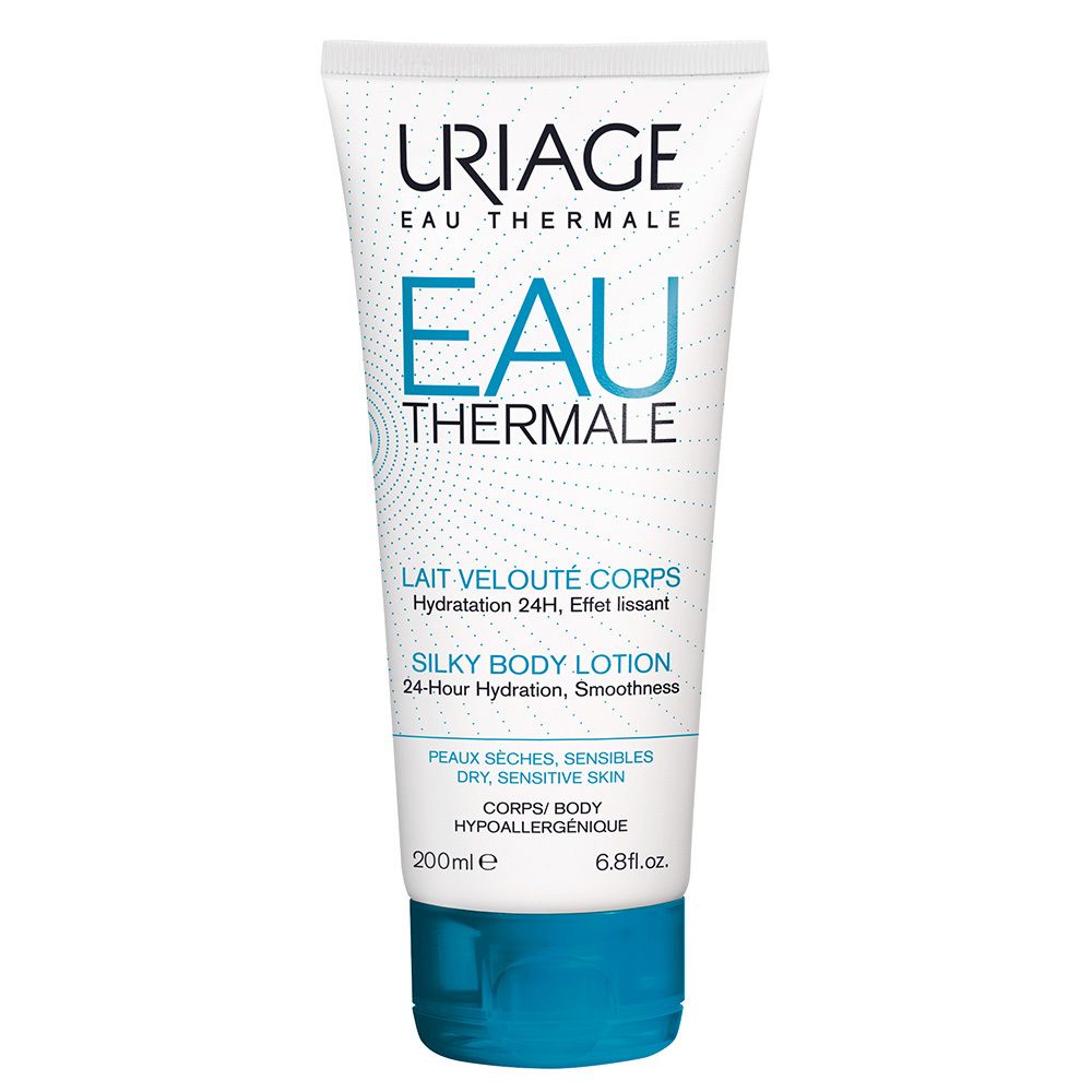 Weiße Tube mit blauem Deckel. Aufschrift: URIAGE EAU THERMALE, EAU THERMALE, SILKY BODY LOTION. Für trockene, empfindliche Haut.