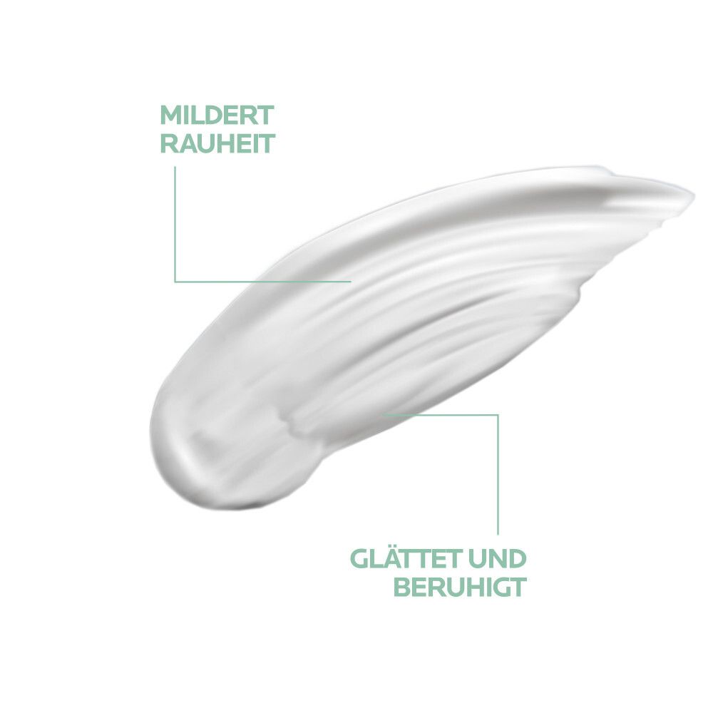 Weißer Creme-Klecks. Text: Mildert Rauheit, glättet und beruhigt.