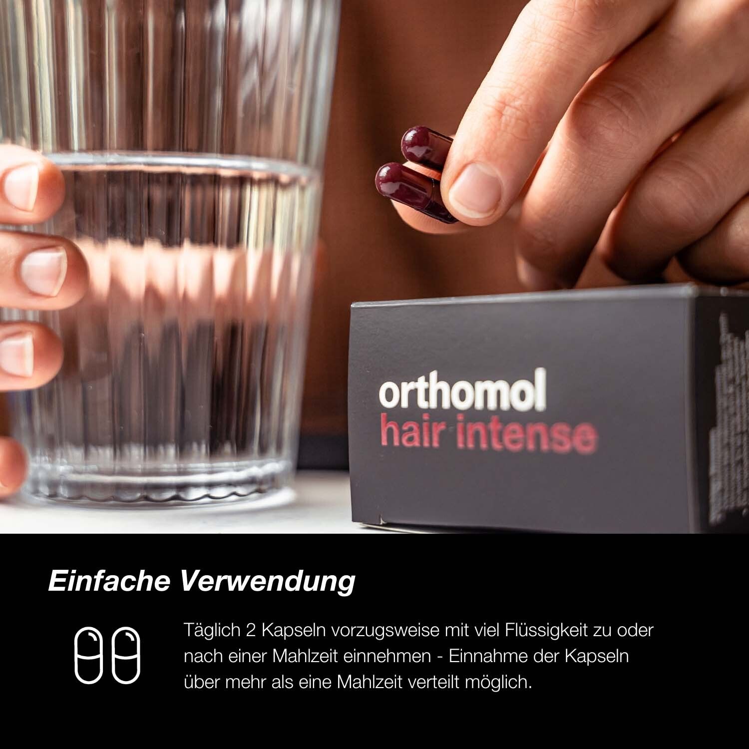 Zwei Kapseln neben Glas Wasser. Orthomol hair intense. Einfache Verwendung.