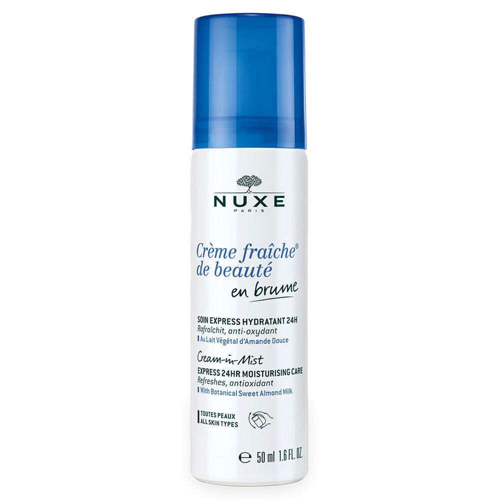 Weiß-blaue Sprühflasche mit Produktnamen und Logo. Text: Crème fraîche de beauté en brume. 50 ml.