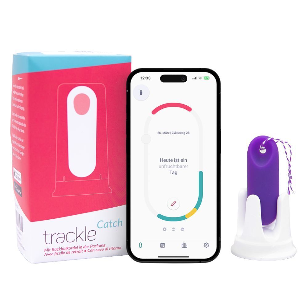 Packung und lila Trackle Catch Verhütungsmittel mit App-Anzeige auf dem Smartphone.
