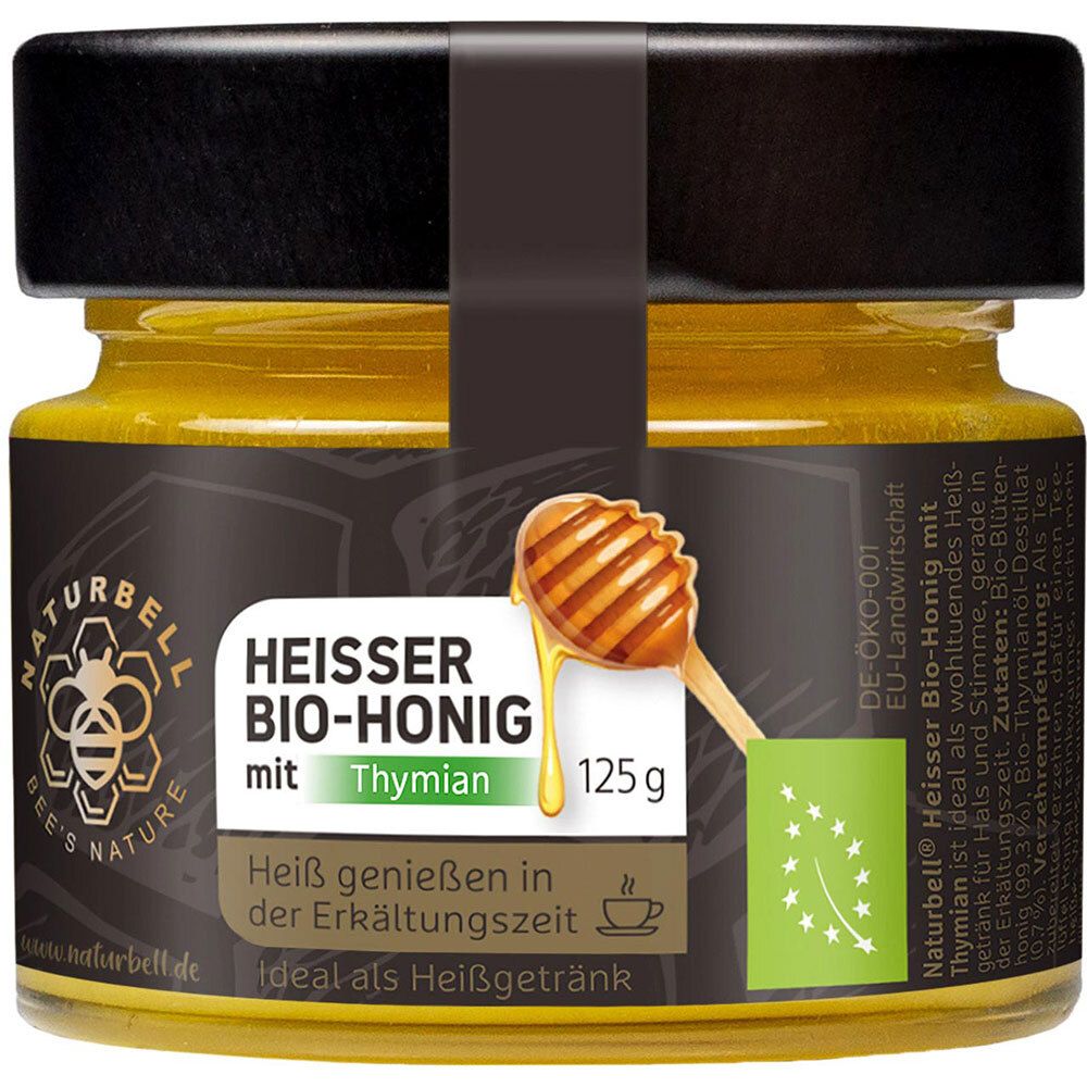 Glas mit Honig. Aufschrift: Heisser Bio-Honig mit Thymian. Bio-Siegel. 125g. Ideal als Heißgetränk.