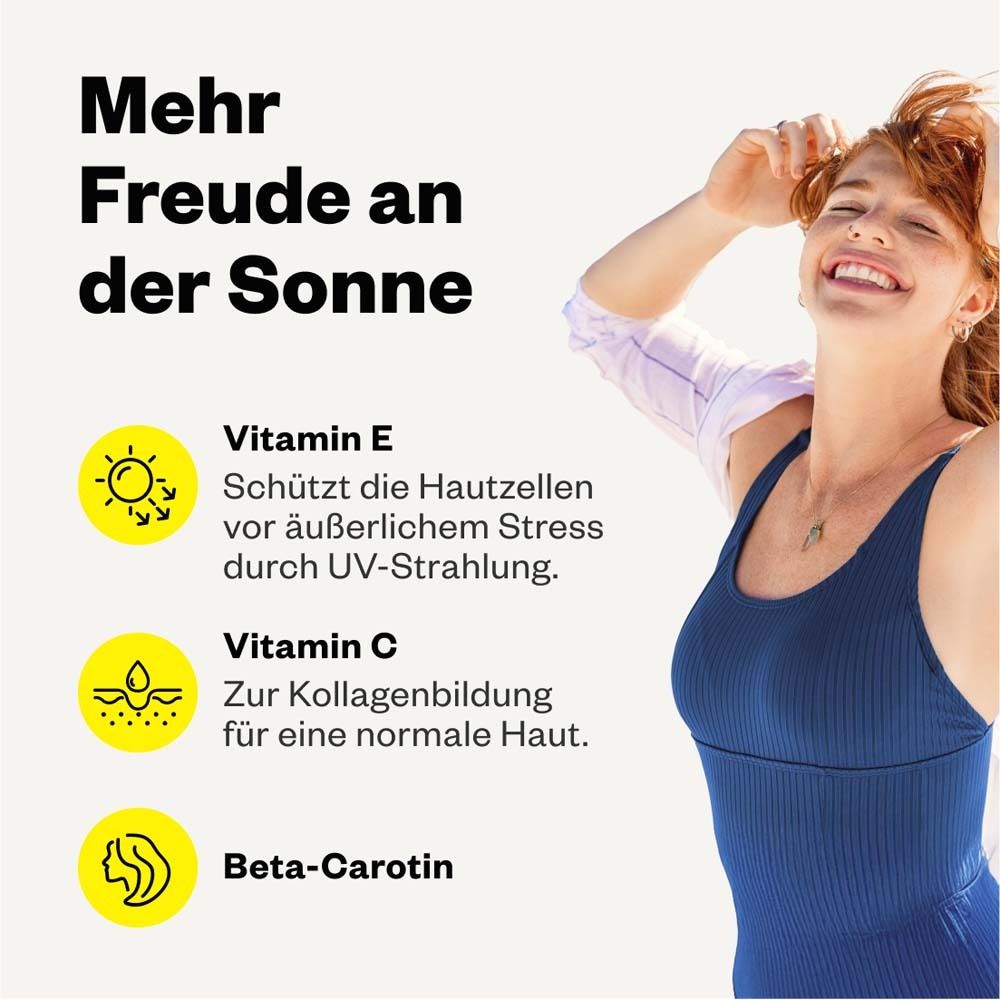 Frau in blauem Top. Text: Mehr Freude an der Sonne. Vitamin E, C und Beta-Carotin.