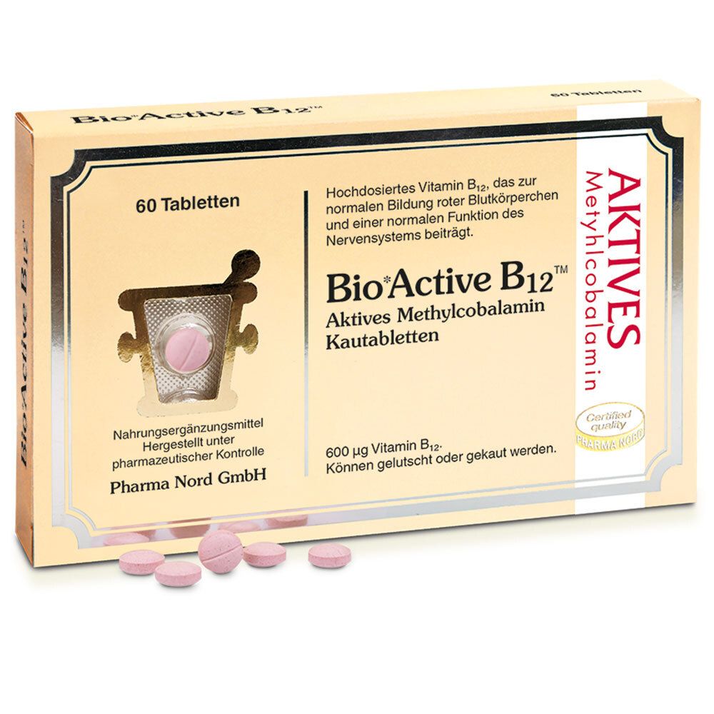 Karton mit Bio® Active B12™ Tabletten. 60 Tabletten. Rosa Tabletten liegen daneben.