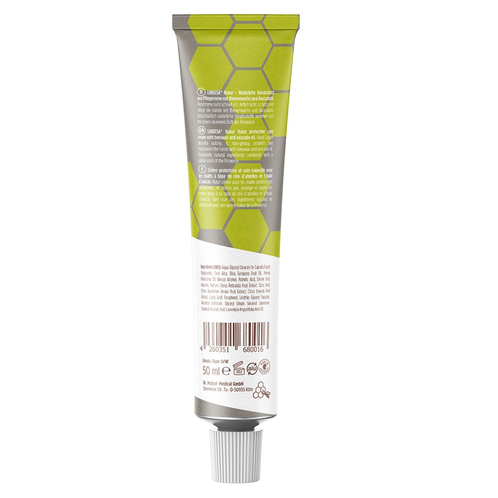 Rückseite der Creme-Tube. Text in mehreren Sprachen. Aufschrift: 50 ml. Logo: Dermatologisch getestet. Grüner Hintergrund mit Wabenmuster.