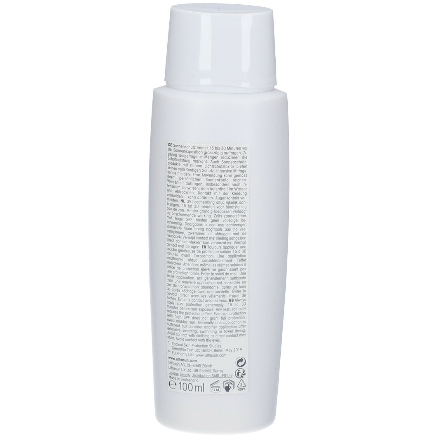Rückseite einer weißen Flasche. Text in mehreren Sprachen. Aufschrift: 100ml. Logos und Informationen.