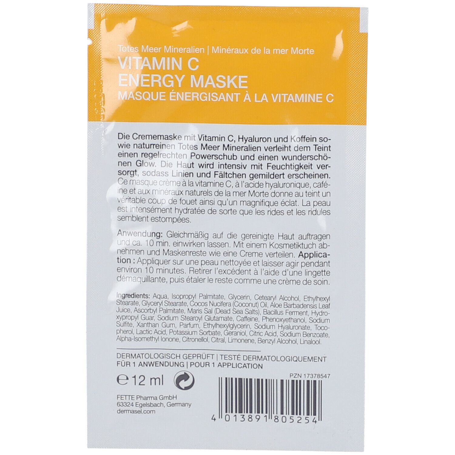 Kleine, weiße Verpackung mit Text. Enthält Informationen zu Inhaltsstoffen und Anwendung. Text: Vitamin C Energy Maske, 12 ml.