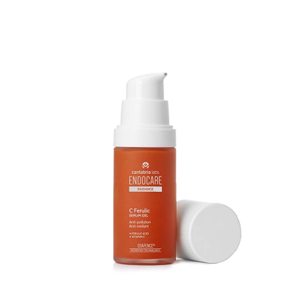 Serumflasche mit geöffnetem Deckel. Orangefarbene Flasche mit Produktnamen und Inhaltsstoffen. Endocare C Ferulic.