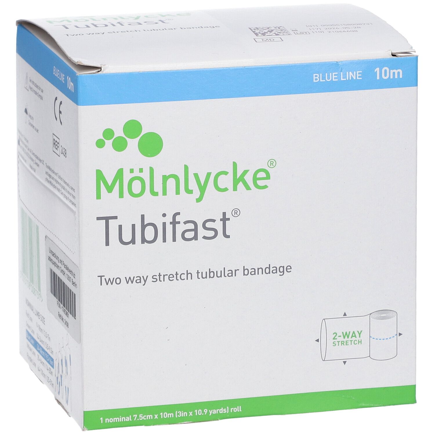 Vorderseite der Tubifast-Verpackung. Weißer Karton mit blauem Deckel. Aufschrift: Mölnlycke Tubifast, Two way stretch tubular bandage. 7,5 cm x 10 m.