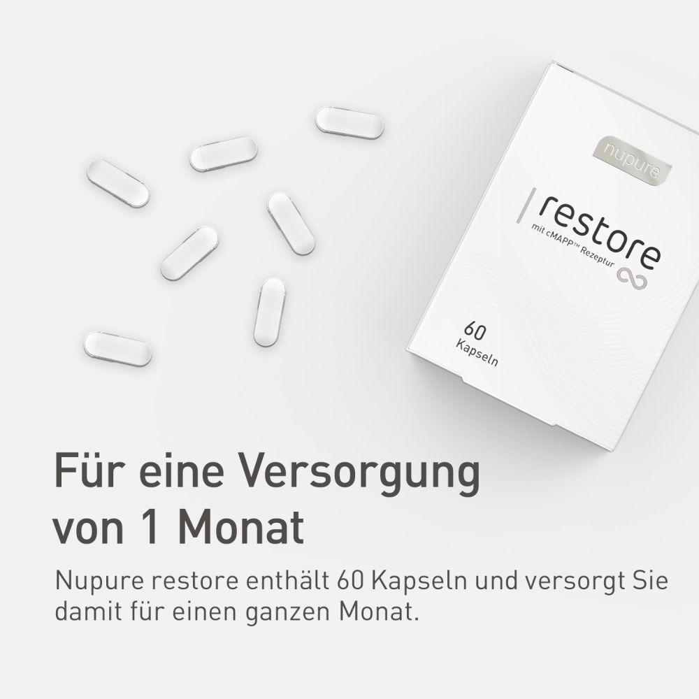 Kapseln neben einer Schachtel. Text: Für eine Versorgung von 1 Monat. Marke: nupure restore.