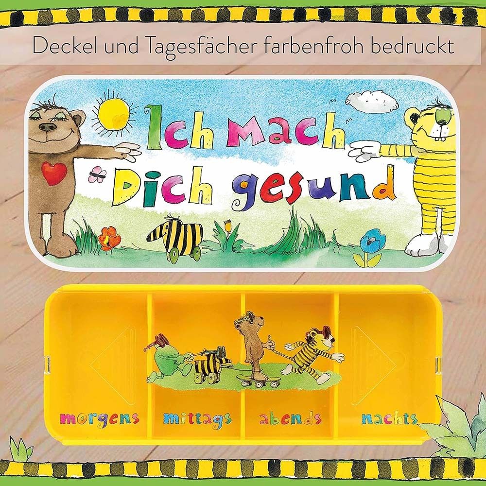 Gelbes Fach mit 4 Unterteilungen. Deckel mit Aufdruck. Aufdruck: Ich mach Dich gesund. Janosch.