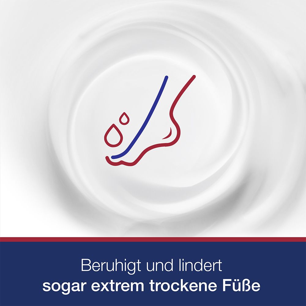 Fuß-Icon mit Tropfen und roter/blauer Linie auf weißem Creme-Hintergrund. Text: Beruhigt und lindert extrem trockene Füße.