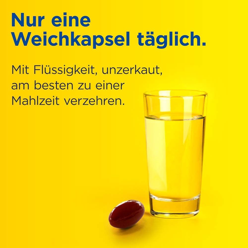 Glas mit Flüssigkeit und eine Kapsel. Text: Nur eine Weichkapsel täglich.