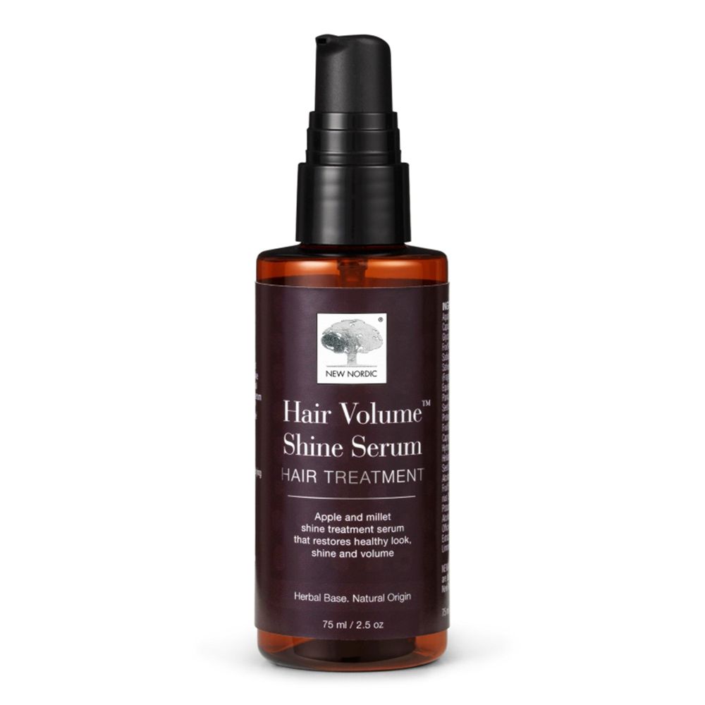Braune Flasche mit schwarzem Pumpverschluss. Aufschrift: Hair Volume Shine Serum. 75 ml.