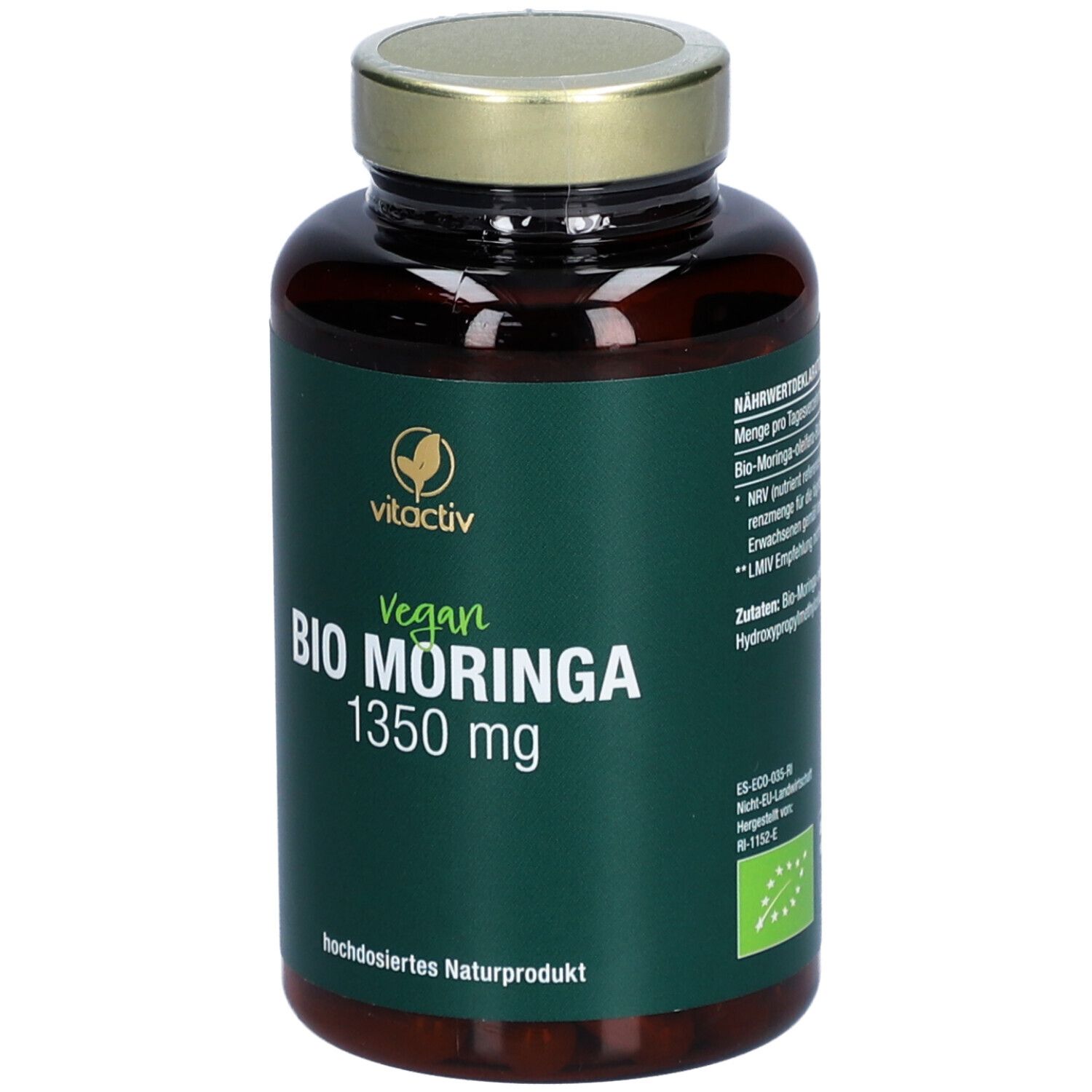 Braune Glasflasche mit grüner Etikette. Aufschrift: Vegan Bio Moringa 1350 mg. Goldfarbener Deckel.