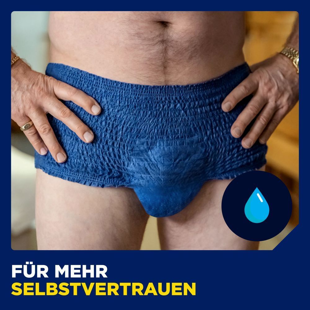 Person in blauen Pants. Blaue Pants mit maskulinem Schnitt. Tropfen-Symbol. Für mehr Selbstvertrauen.