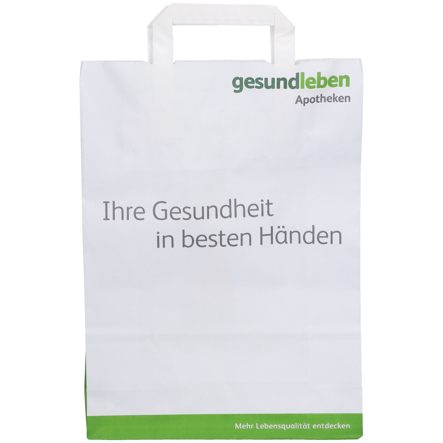 Papiertüte mit Griff, weiß mit grünem Akzent. Aufdruck: gesund leben Apotheken, Slogan.