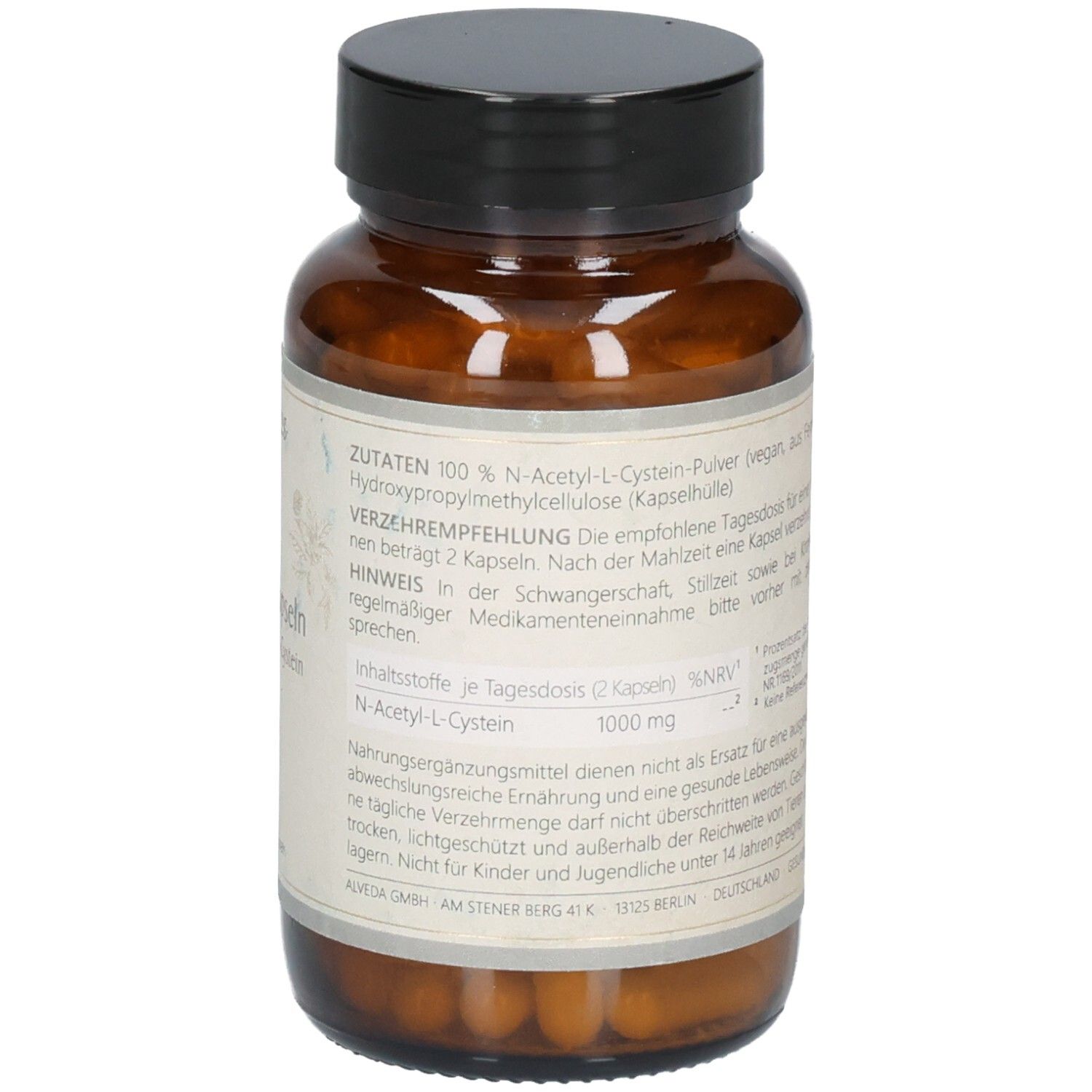 Nahaufnahme der Rückseite einer Flasche mit Kapseln. Etikett mit Zutatenliste und Nährwertangaben für N-Acetyl-L-Cystein.
