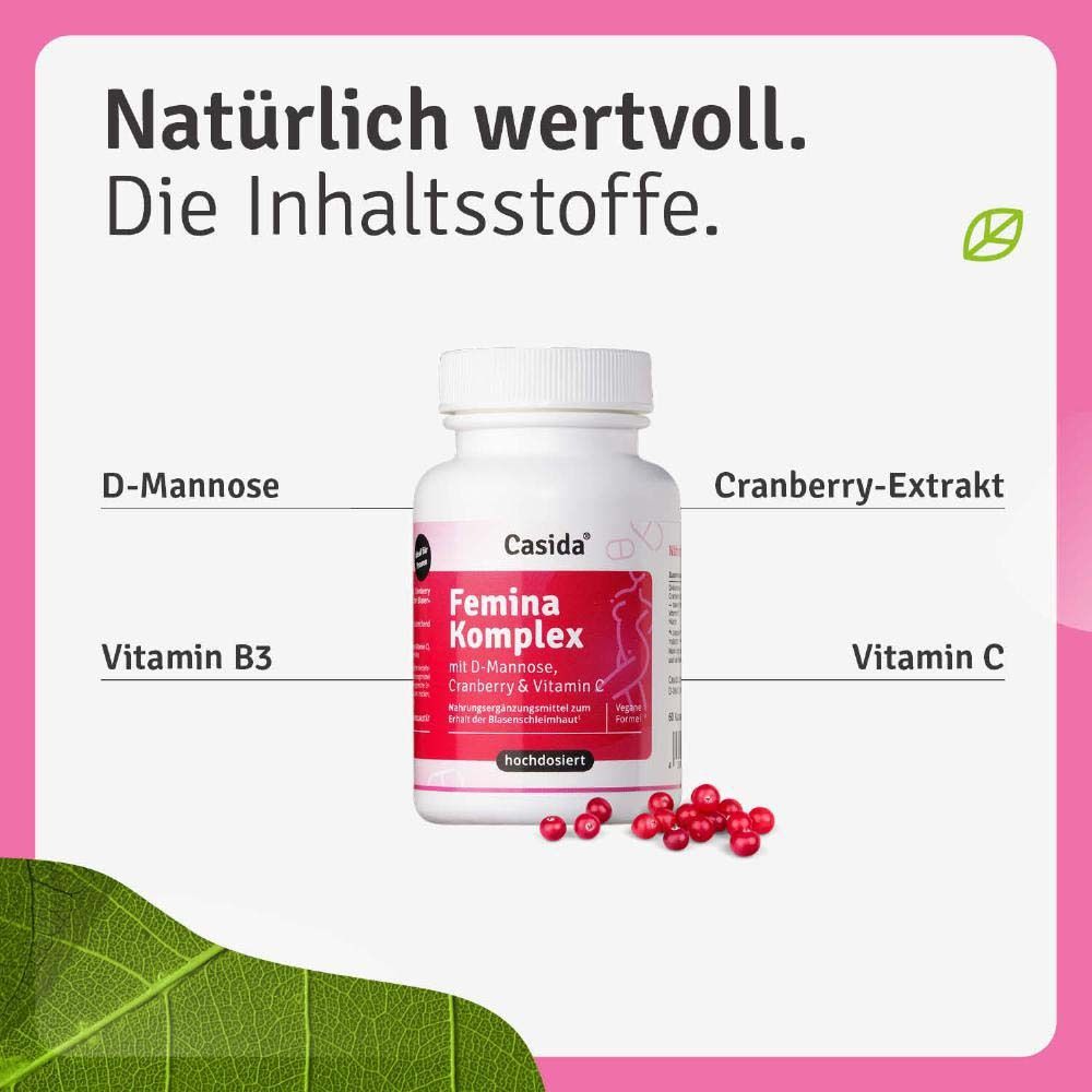 Produktflasche mit Inhaltsstoffen: D-Mannose, Cranberry-Extrakt, Vitamin B3 und Vitamin C. Pinker Hintergrund.