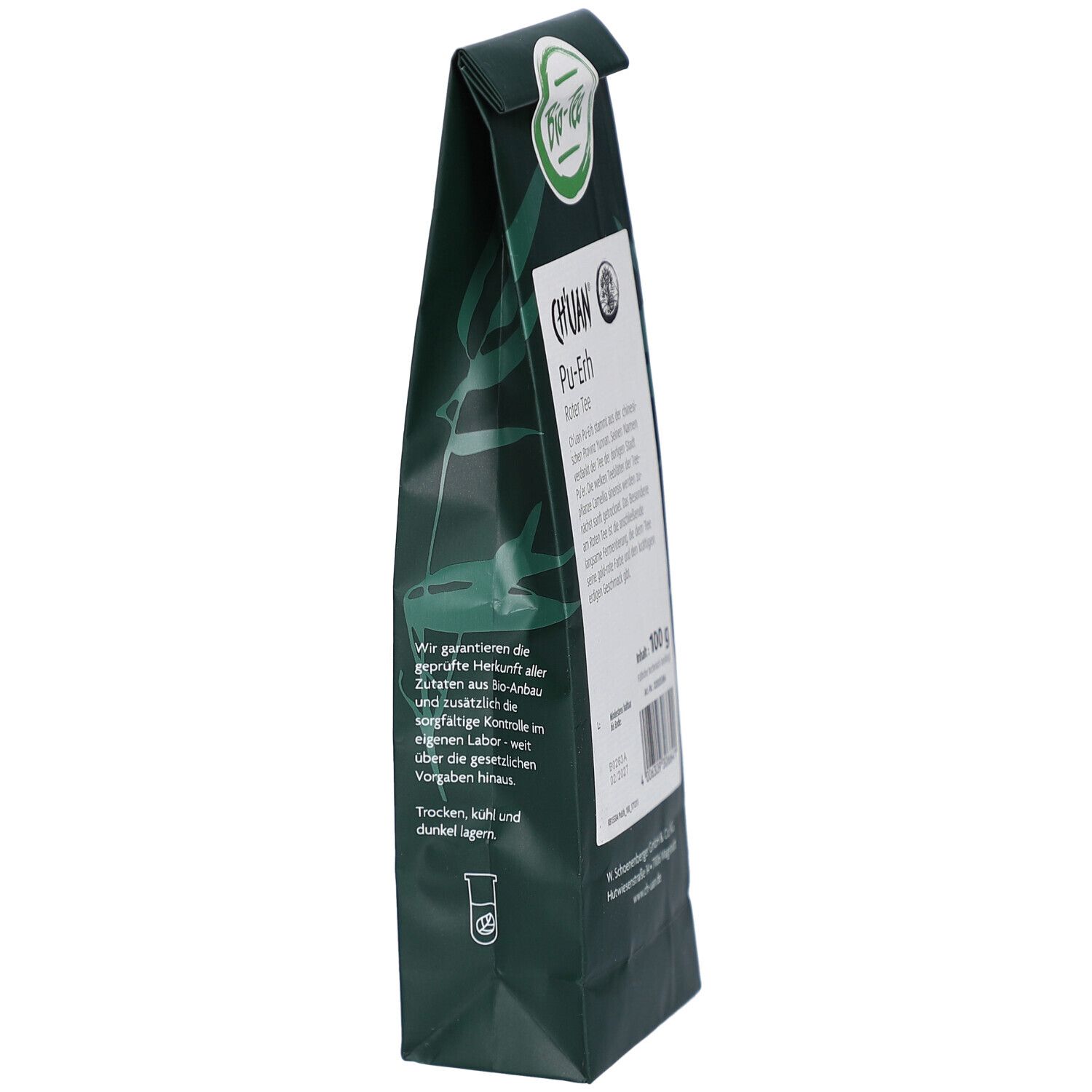 Dunkelgrüne Verpackung, Seitenansicht. Aufschrift: CH'UAN Pu-Erh-Tee. Bio-Siegel. Text über Herkunft.