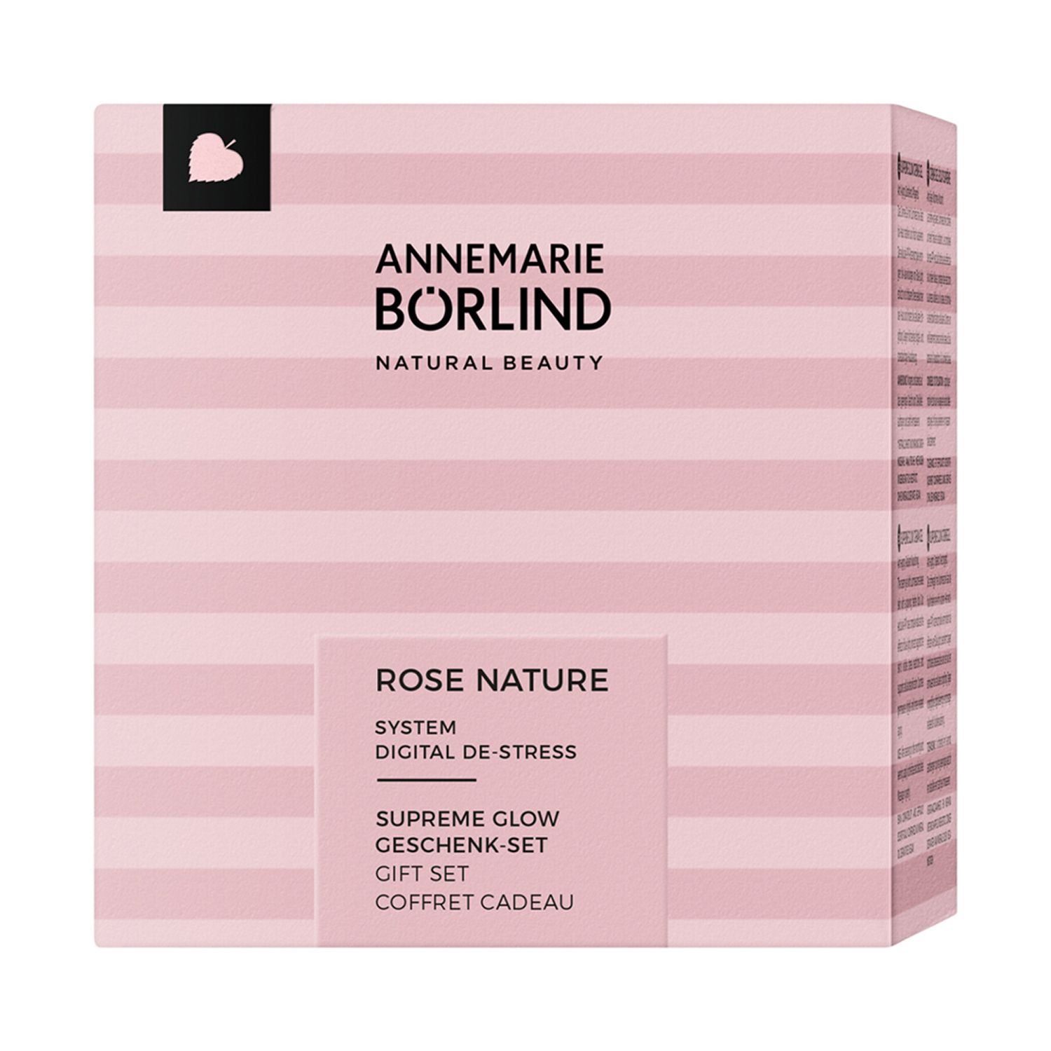 Rosa Geschenkbox mit Streifenmuster. Aufschrift: Annemarie Börlind, Rose Nature, Supreme Glow Geschenk-Set.