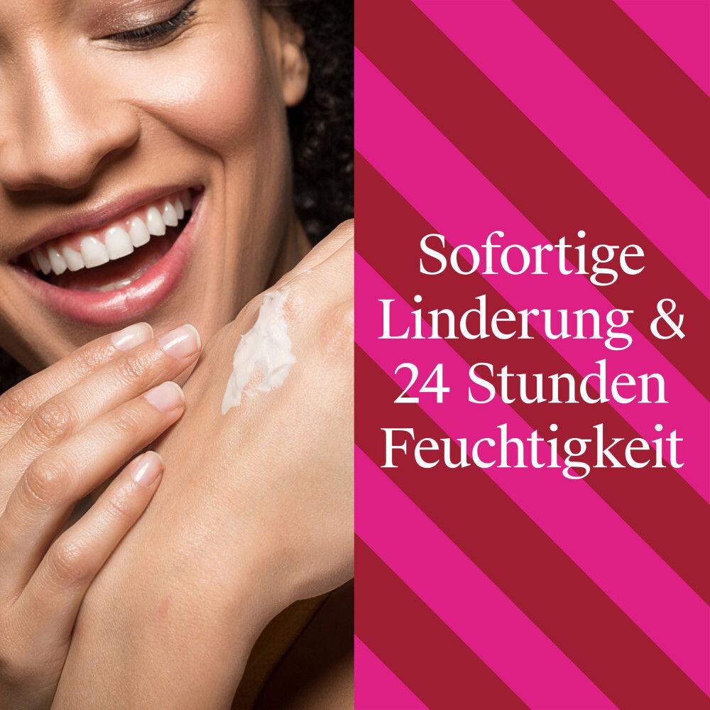 Haut mit Creme eingerieben. Sofortige Linderung & 24 Stunden Feuchtigkeit. Pinker Hintergrund.