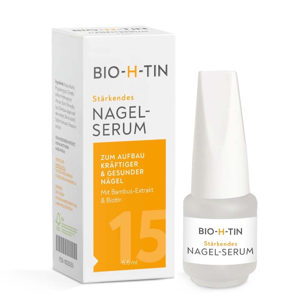 Nagelserum-Fläschchen und Verpackung. Weißes Fläschchen mit weißem Deckel. Verpackung mit Produktinformationen.