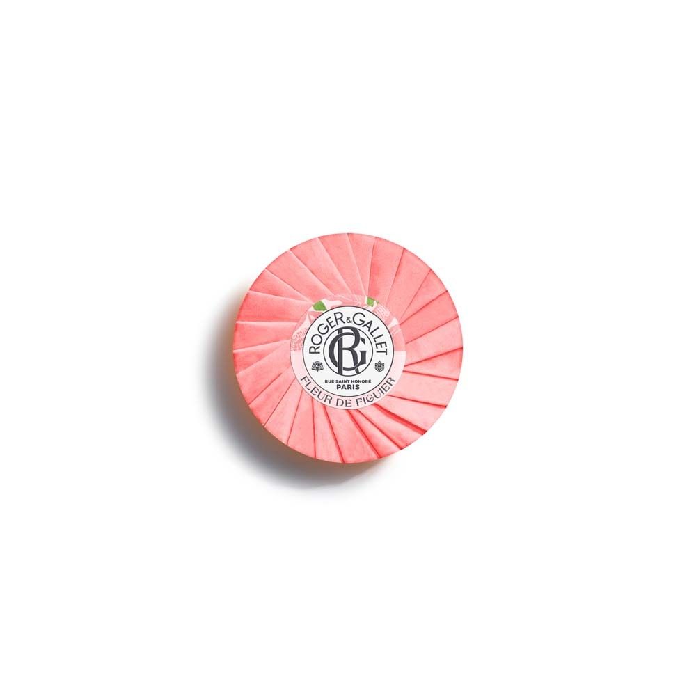 Runde, rosa Seife in Papier verpackt. ROGER&GALLET-Logo und Produktname Fleur de Figuier.