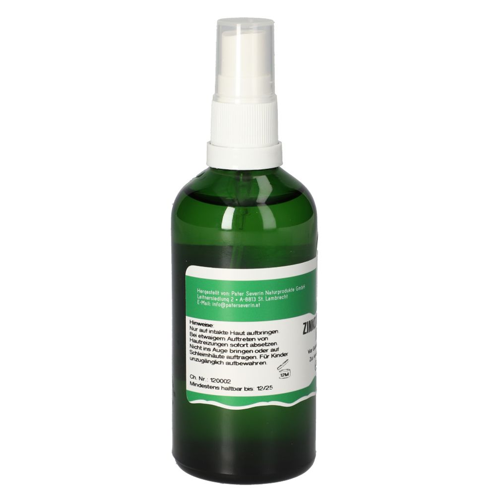 Grüne Flasche mit Sprühkopf. Rückseite mit Text. Herstellerinformationen und Haltbarkeitsdatum.