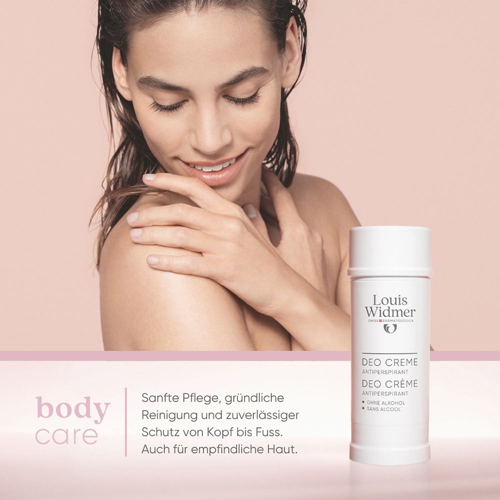 Louis Widmer Deo Crème Antiperspirant. Frau mit Produkt, auf rosa Untergrund.