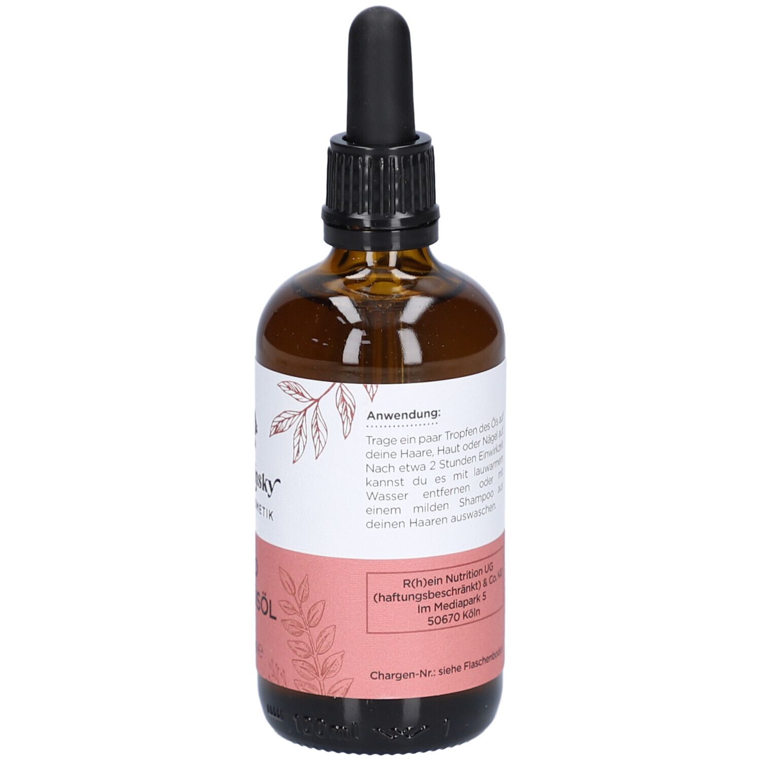 Braune Glasflasche mit Pipette. Etikett mit Anwendungshinweisen.