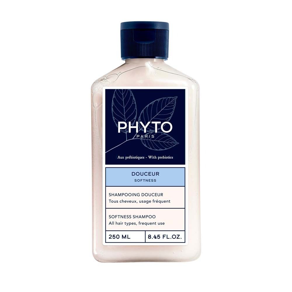 PHYTO PARIS Shampoo-Flasche. Weißes Shampoo mit blauem Deckel. Etikett mit Produktnamen und Inhaltsangaben.