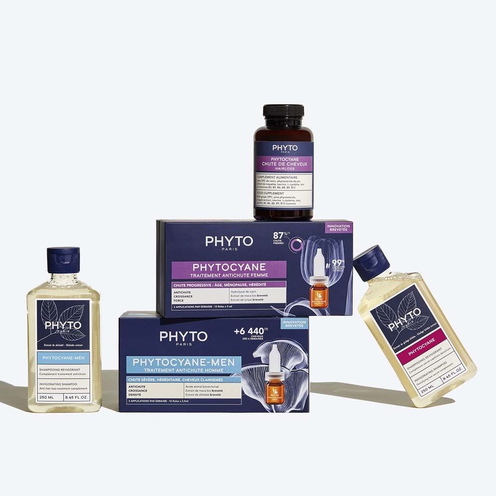 Mehrere Produkte, darunter Shampooflaschen und eine Kapselpackung. Alle Produkte haben Etiketten mit Logos und Produktbezeichnungen.