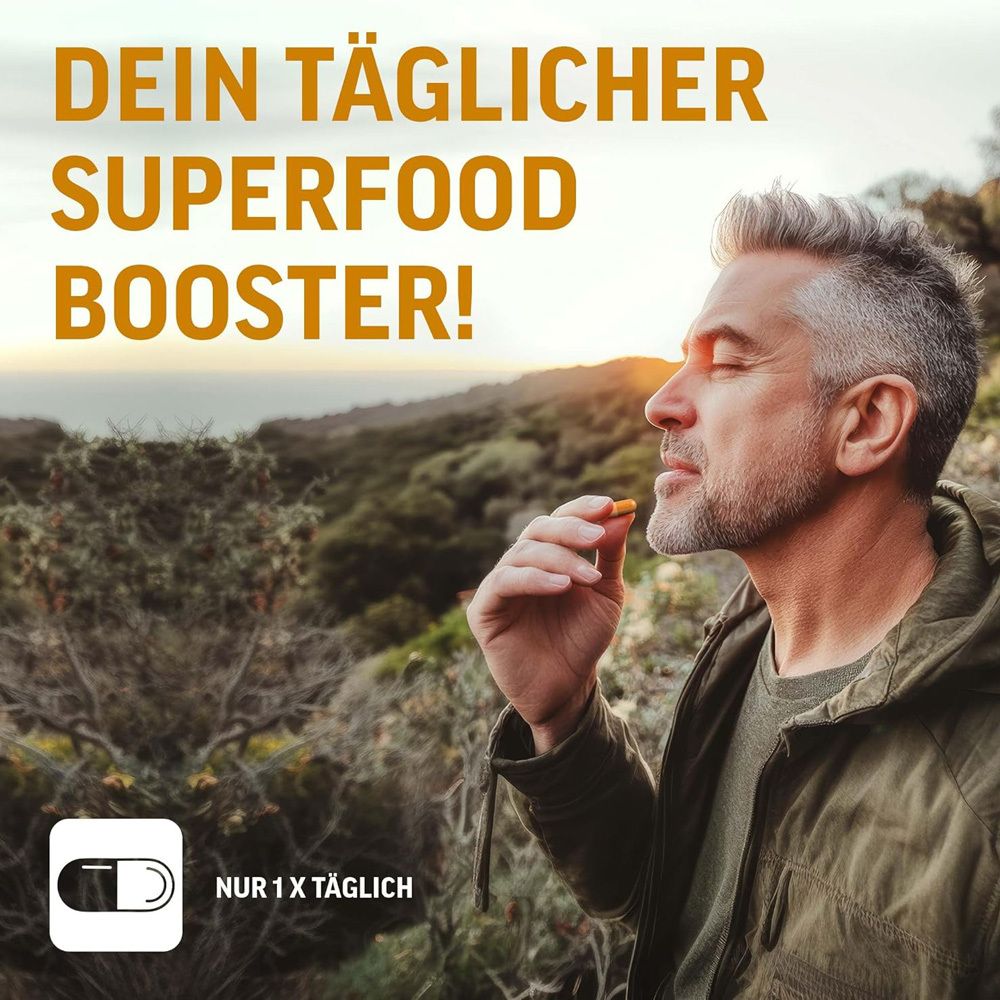 Mann nimmt Kapsel. Text: Dein täglicher Superfood Booster! Nur 1x täglich.