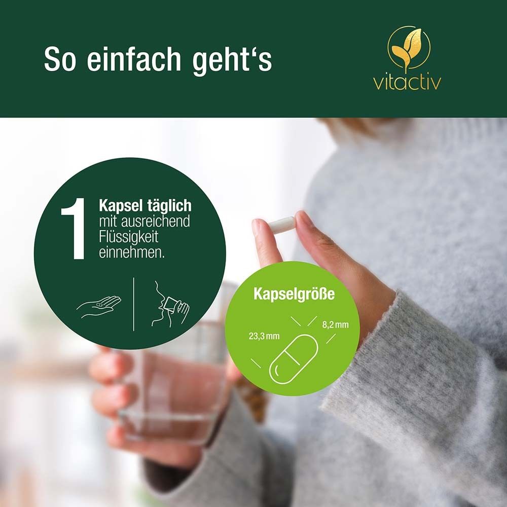 Hand hält Kapsel. Text: Einnahme. Kapselgröße: 23,3 x 8,2 mm.