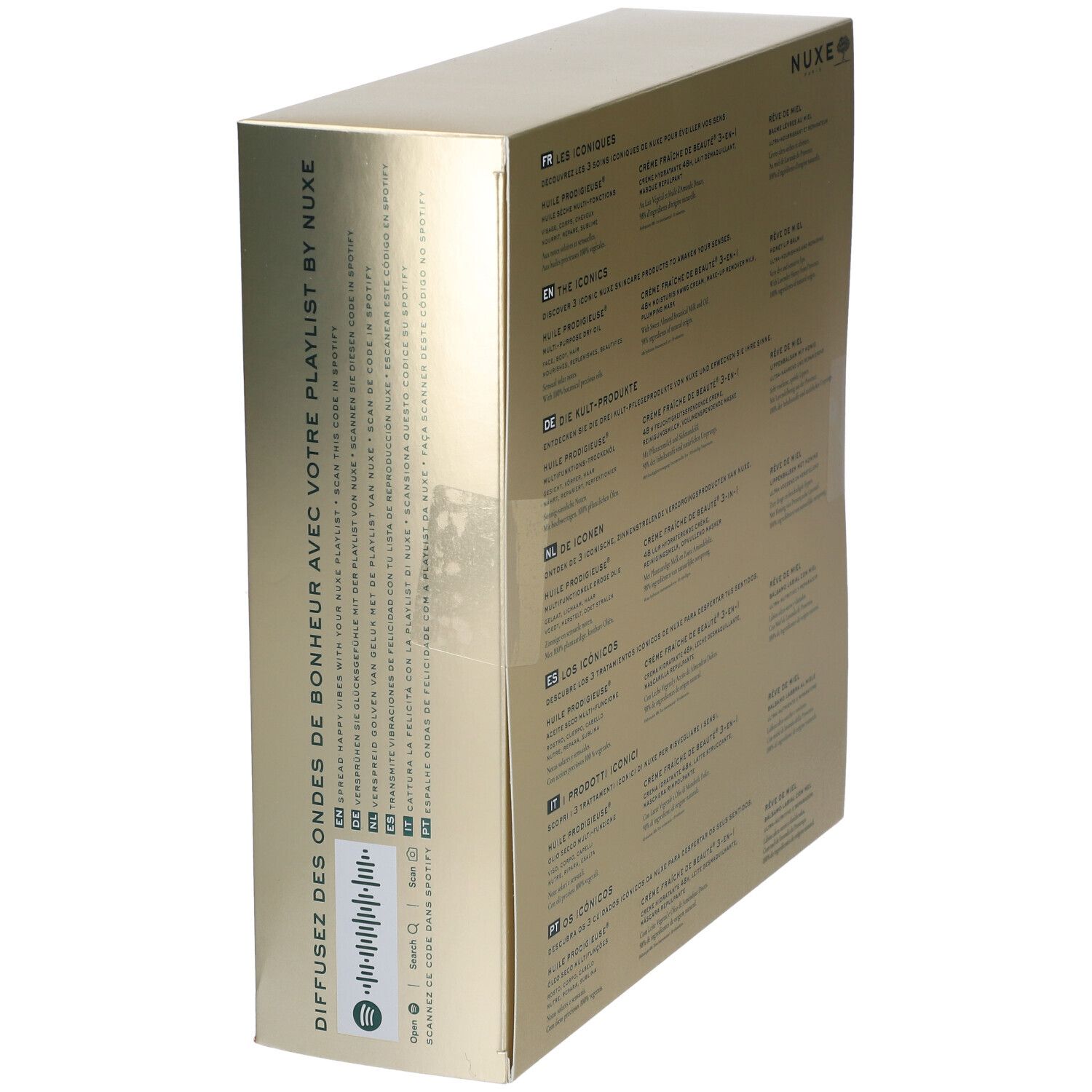 Seite der Geschenkbox mit Text und QR-Code. Goldene Verpackung mit NUXE-Logo. FSC-Logo.