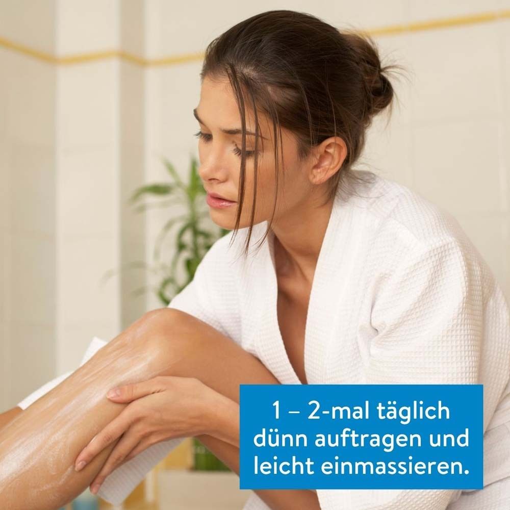 Frau trägt Lotion auf. Text: 1-2 mal täglich dünn auftragen und leicht einmassieren.