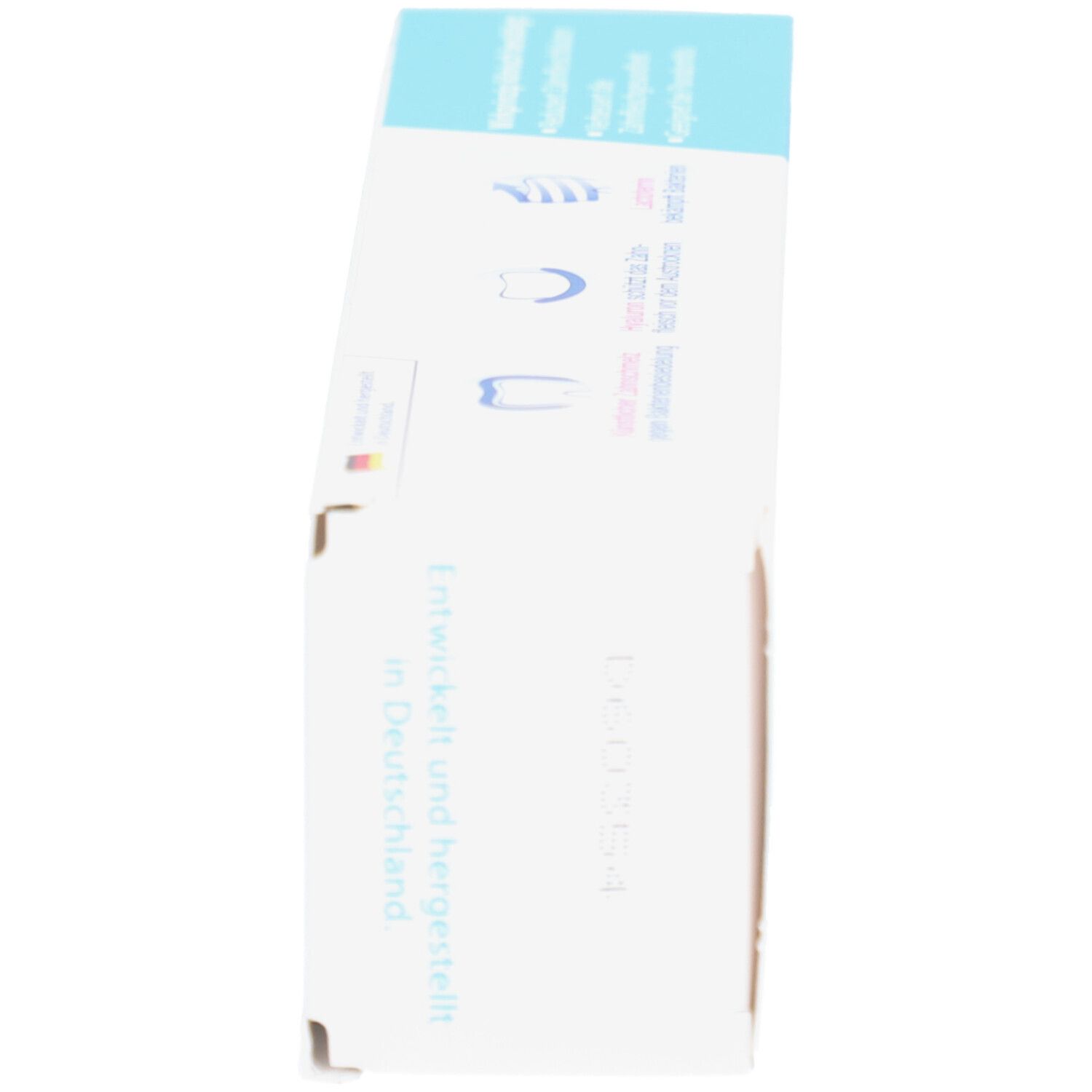 Seitenansicht der Schachtel Bioniq Repair Zahncreme Plus. Weiß mit blauem Logo und Text. Hergestellt in Deutschland.