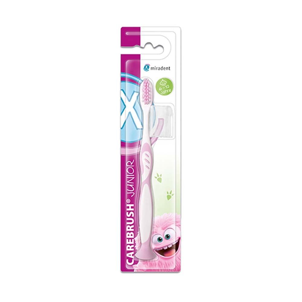 Zahnbürste Carebrush Junior pink, in Verpackung. Miradent-Logo. Altersempfehlung 6-12 Jahre. Mit Schutzhülle und Saugnapf.